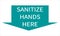 Sanitize hands here arrow shaped icon.