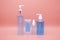 sanitizer gel pump dispenser. Clear sanitizer in pump bottle, for killing germs, bacteria and virus. isolate on Pink background