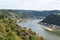 Sankt Goarshausen, Germany - 08 04 2022: Loreley passage, Burg Katz and cargos ships in the passage