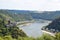 Sankt Goarshausen, Germany - 08 04 2022: Loreley passage with Burg Katz and cargos ships in the passage