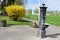 Sankt Sebastian, Germany - 04 20 2021: Fountain and stone dog at Rheinwiesen