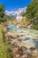 Sankt Sebastian pilgrimage church with alpine turquoise river alpine landscape view, Ramsau