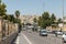 Sanliurfa, Turkey- 07.17.2021; city â€‹â€‹center and traffic. old city texture in background. irregular planning.