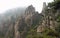 Sanqingshan Mountain in Jiangxi Province, China. Misty mountain scenery with rocky peaks on Mount Sanqing