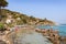 Sant Andrea, Elba Island, Italy - 04 June 2022 Tourists enjoying white sandy beach perfect for snorkeling and relaxation at Sant A