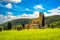 Sant Antimo Montalcino church and wheat field. Orcia, Tuscany, I