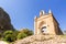 Sant Joan chapel in the mountains of Montserrat Monastery, Catalonia, Barcelona, Spain Sunny day, blue sky