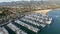 Santa Barbara pier and beach, California. Aerial view. Santa Barbara California Harbor pier, aerial drone. Yachts and