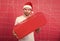 Santa bring gift for you. Man attractive santa claus carry big box. You deserve good gift. Christmas holiday celebration