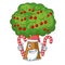 Santa with candy cherry tree next to cartoon house