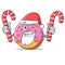Santa with candy Donut mascot cartoon style