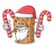 Santa with candy granola bar mascot cartoon