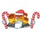 Santa with candy orange sponge coral in shape mascot