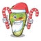 Santa with candy stuffed avocado in the mascot shape