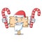 Santa with candy wooden board mascot cartoon