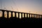 Santa Clara Aqueduct, Vila do Conde, Portugal in silhouette at sunset