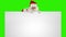 Santa Claus appears behind a white sheet with space for tex, Green Screen, stock footage