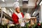 Santa Claus bakes a pie in the kitchen on Christmas Day