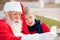 Santa Claus And Boy Taking Selfportrait Through