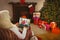 Santa claus on christmas laptop video call with smiling senior caucasian couple