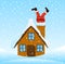 Santa Claus climbing the chimney of a wooden house