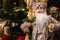 Santa Claus doll on Christmas market. Friendly Santa toy. Christmas gifts concept. Jolly Saint Nicholas.