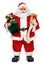 Santa Claus doll with presents and name list frontal view