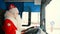 Santa Claus is driving a car. Father christmas drives a truck.