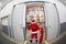 Santa Claus with empty sack doing wholesale shopp