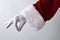 Santa claus hand making gesture of catching delicately isolated white