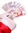 Santa Claus hand with money Russian rouble.