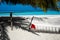 Santa Claus hat at caribbean sandy beach, Maldives. Santa Clause hat on hammock on the beach.