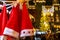 Santa Claus hats hangs on shop at market, Austria