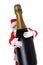 Santa Claus with his arms wrapped around a giant bottle of Champagne, isolated on white
