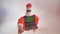 Santa Claus holds a laptop with green screen and attracts attention to it.