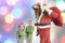 Santa Claus and Kids dressed in Elven costumes. North Pole.