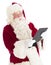 Santa Claus Looking At Digital Tablet