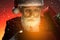 Santa Claus looking at opened gift box with magic light