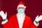 Santa Claus medical mask says there is no gift empty with his hands on red background