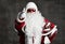 Santa Claus pointing show thumbs up sign for New year, Merry Christmas