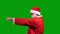 Santa Claus in red costume drag something on green chroma key background