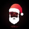 Santa Claus with red hat and glasses on black background.