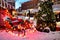 Santa Claus`s sleigh and Christmas tree in bokeh lights. Background