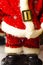 Santa Claus, Santa Claus toy. Beard boots, belt in macro. The suit is New Year`s. Figure