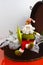 Santa Claus sits on vintage brouwn coffer with white christmas t