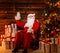 Santa Claus sitting on rocking chair