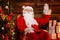 Santa Claus sitting on rocking chair