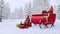 Santa claus sleigh among snowy winter forest 4K