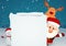 Santa Claus with snowman and Rudolph the reindeer on winter scene