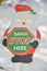 Santa claus stop here christmas paper sign